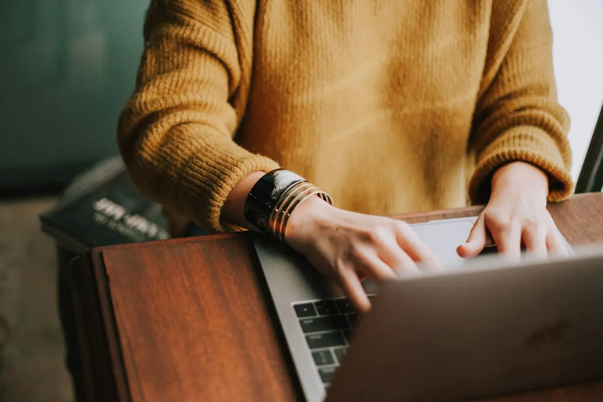 Working on a client marketing plan on a laptop