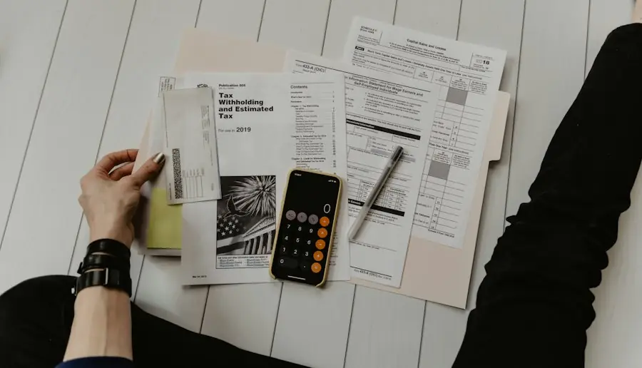 Financial documents and a calculator on a desk